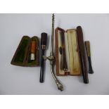 A Collection of Miscellaneous Cigarette Holders, including amber and silver, tortoise shell and 9 ct