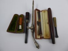 A Collection of Miscellaneous Cigarette Holders, including amber and silver, tortoise shell and 9 ct