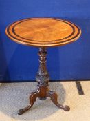 A Victorian Mahogany Inlaid Wine Table, having carved tripod base, approx 69 cms dia.