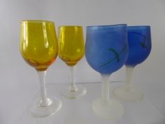 A Collection of Thirteen 'Acid Yellow' Studio Wine Glasses, etched 'Everglassling', together with