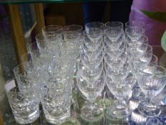 Six Cut Glass Webbs Whiskey Tumblers, together with nine cut glass wine glasses.