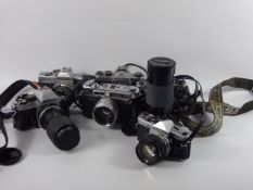 A Quantity of Vintage Camera Equipment, including a Minolta SRT101 with a 55mm Lens, a Honeywell