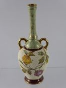 A 19th Century Continental Twin Handled Vase, the vase with pebble glaze over painted with roses,