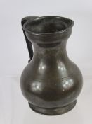 A French Pewter Wine Measure, 1 litre capacity, bulbous form, 19th century.