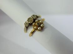 A Lady's 9 ct Diamond and Seed Pearl Ring, 6 x 2.5 mm seed pearls and 1 x 5 pt old cut dias, size