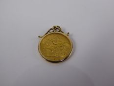 A George V 1914 Solid Gold Half Sovereign in 9 ct Gold Mount, approx 4.9 gms