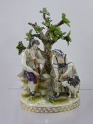 Volkstedt-Rudolstadt Figurine, 19th Century depicting figures in a garden with a goat beneath an oak