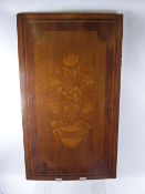 An Antique Mixed Wood Panel, with decorative inlay depicting a full flowering plant, approx 65 x