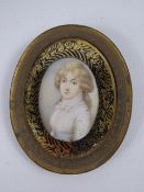 An Antique Miniature Portrait on Ivory, depicting a lady, approx 6.5 x 5.5 cms.