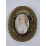 An Antique Miniature Portrait on Ivory, depicting a lady, approx 6.5 x 5.5 cms.