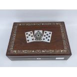 A Victorian Rose Wood and Mother of Pearl Inlay Games Compendium, the rosewood box having finely