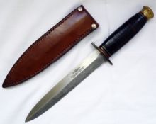 A WWII Fighting Knife by Southern a& Richardson, Sheffield, the knife has a hand crafted 6.75" blade