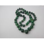 A Lady's Antique Polished Malachite Bead Necklace, approx 65 cms.