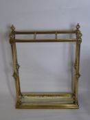 A Brass Stick Stand, with drip tray, approx 13 x 44 x 62 cms