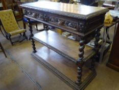 A Edwardian Welsh Style Two Tier Buffet, having carved drawers to top with lion mask handles, on