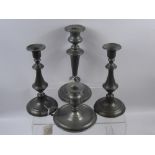 A Pair of 19th Century English Pewter Candlesticks, together with a single candlestick of large size