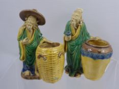A Pair of Chinese Glazed Pottery Figurines, depicting elderly men with baskets, approx 15 cms high.