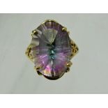 A Lady's Gems 9 ct Gold Rainbow Quartz Ring, the quartz 18 x 13 mm, size N, approx 6.7 gms, with the