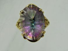 A Lady's Gems 9 ct Gold Rainbow Quartz Ring, the quartz 18 x 13 mm, size N, approx 6.7 gms, with the