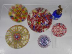 Three Vintage Multi Coloured Cane Paperweights, together with two miniature paperweights and a glass