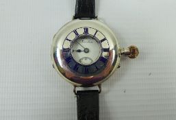 A Gentleman's Solid Silver and Enamel Self Wind Half Hunter Trench Watch, by H.W. Benson, London,