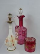 A Bohemian Hand Painted Decanter & Stopper, with floral spray, hand painted cranberry cotton wool