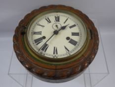 An Oak Cased Ships Clock, white enamel face with Roman dial, approx 24 x 24 cms