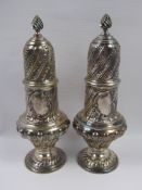 A Pair of Generous Victorian Silver Casters, London hallmark dated 1892/93, mm Thomas Bradbury, 24