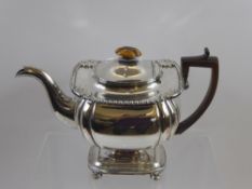 A Generous Proportioned Silver Plated Tea Pot, with wooden finial and handle on stepped plinth,