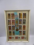 A Folder of Miscellaneous World Coins, together with a framed set of military cigarette cards