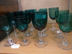 A Quantity of Late Victorian Coloured Glass, including fifteen green sherry glasses.