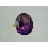 A Lady's Antique 18 ct Gold Amethyst Ring, the stone 18 x 15 mm, size S, approx 8.2 gms, approx 18 x
