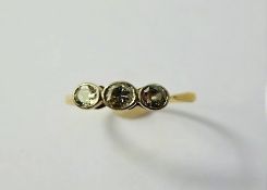 A Lady's Antique 18 ct Gold and Platinum Three Stone Old Cut Diamond Ring, size N, approx 39 pts
