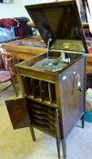 An Oak Cased Columbia Gramophone, together with accessories including a record cleaner, Top Tone