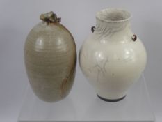 A Peter Sparrey Raku White Pottery Crackle Glaze Vase, together with another ovoid vase with