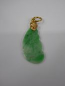 A Chinese Apple Green Jade Pendant, in the form of a bat, on a 14 ct gold loop, approx 2.7 cms,