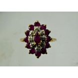 A Lady's Vintage 9 ct Yellow Gold Marquise Ruby and Diamond Ring, the single ruby 5 x 2.5 mm, 12 x