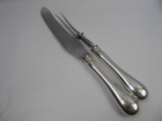 A Canadian Birk Sterling Silver Handled Carving Set, comprising knife and fork stamped 'Sterling'.