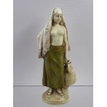 A Royal Dux Figurine, of a water carrier, approx 19 cms