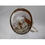 A Lady's Fine Antique Shell Cameo, the cameo depicting a feminine nude feeding a bird, approx 4 x 3.