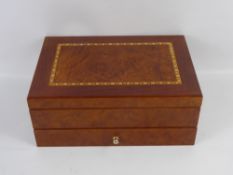 A Wooden Inlaid Jewellery Box.