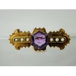 A Lady's Edwardian 14 ct Amethyst and Seed-Pearl Pendant Brooch, amethyst measures 13 mm, six seed
