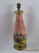 An Early 20th Century Glass Hand Painted Lamp Base, depicting a pastoral landscape scene, approx