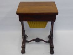 A William IV Mahogany Sewing Table, the table having a green baize folding top with drawer and