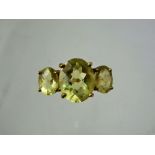 A Lady's Gems 9 ct Gold Citrine Ring, centre stone 12 x 10 mm, approx 3.18 ct, side stones 8 x 6