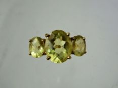 A Lady's Gems 9 ct Gold Citrine Ring, centre stone 12 x 10 mm, approx 3.18 ct, side stones 8 x 6