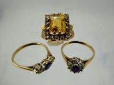 A Lady's 9 ct Gold Blue and White Stone Ring, size T together with another 9 ct gold amethyst ring