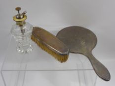 An Art Deco Silver Plate and Gold Enamel Atomiser, together with a solid silver hand mirror and