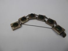 A Vintage Lady's Silver Scarab Beetle Bracelet, the square link bracelet having centrally set scarab