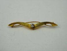 A Lady's 15 ct Yellow Gold and Diamond Art Nouveau Solitaire Brooch, one old cut dias, approx 12